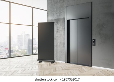 Black Poster With Copyspace For Your Text On Wooden Floor Near Stylish Dark Elevator And City View From Big Window. 3D Rendering, Mockup