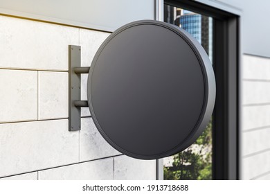 Black round signboard on wall. Exhibition and advertising concept. Mock up. 3D Rendering