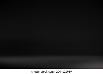 Black scene background in the studio room. Premium abstract background pattern in gray and black tones. space for website banner