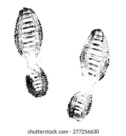 Black Shoe Prints On A White Background