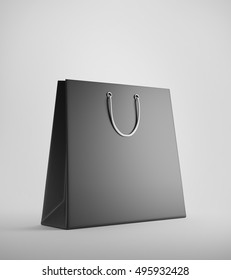 Black Shopping Bag Standing Against White Background. Concept Of Consumerism. 3d Rendering. Mockup