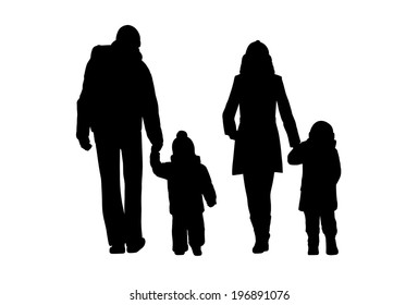 black silhouettes of a family with two little children walking outdoor holding their hands by cold weather, back view