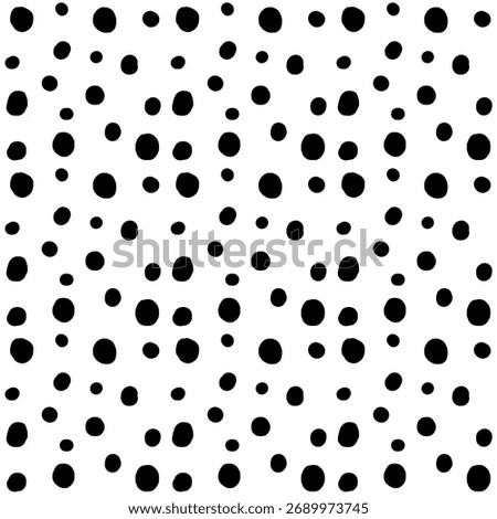 Black splodges in a seamless repeating pattern