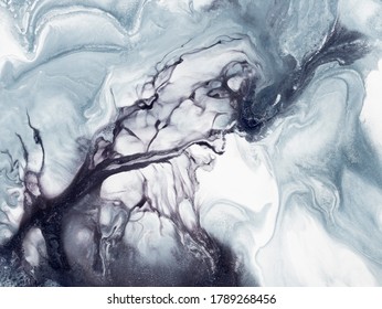 Black and white creative abstract hand painted background, marble texture, abstract ocean, fluid art. Modern art. Contemporary art.