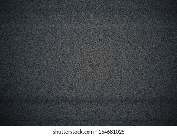 Black And White Noise On A TV Screen With No Signal, Also Called TV Snow.