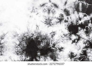 black and white tie dye pattern hand dyed on cotton fabric abstract texture background.