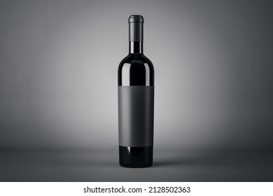 Black wine bottle with empty blank label with copyspace for your logo on abstract dark background, red wine concept. 3D rendering, mockup - Powered by Shutterstock