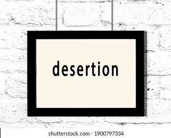 Black Wooden Frame With Inscription Desertion Hanging On White Brick Wall 