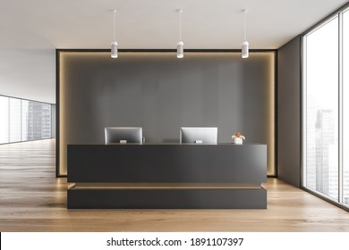 Black and wooden reception room with two computers and armchairs. Black wall with yellow backlight, reception entrance with office desk near window, front view, parquet floor 3D rendering, no people