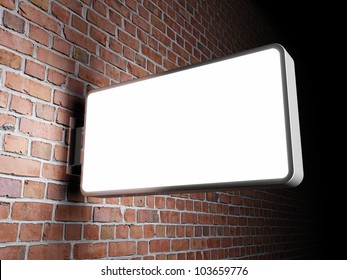 Blank Advertising Billboard On Brick Wall At Night