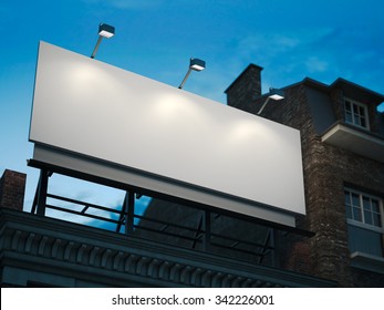 Blank Billboard Standing On Classic Building In The Night