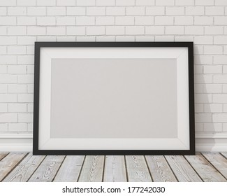 Blank Black Horizontal Picture Frame On The White Concrete Wall And The Vintage Floor 