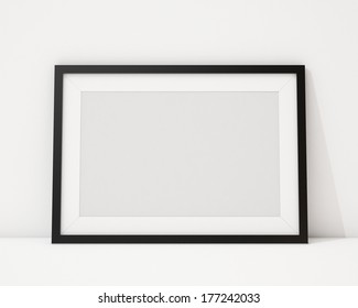 Blank Black Horizontal Picture Frame On The White Interior Background