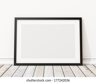 Blank Black Horizontal Picture Frame On The Wall And The Floor 