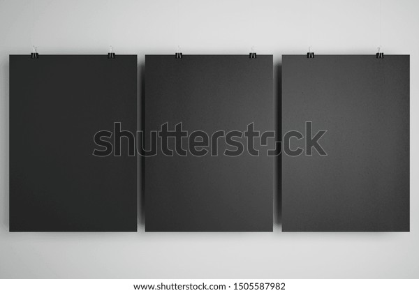 Blank black minimalistic\
cardboard notebooks at light background, copyspace. 3D\
Rendering
