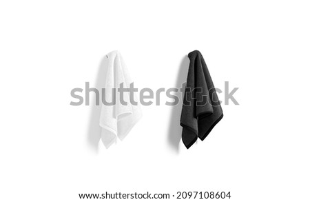 Blank black and white towel hanging on hook mock up, 3d rendering. Empty fiber towels on wall for bath hygiene mockup, side view, isolated. Clear small wiping micorfiber template. Foto stock © 