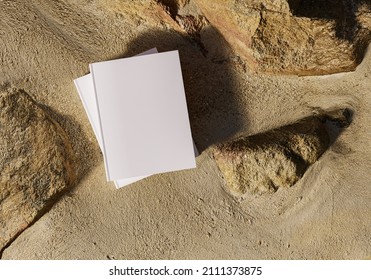 Blank Book Model Placed On Rocks In The Sand, Notebook Mockup, Mockup On Nature Background 3d Illustration 03