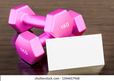 Blank business card for fitness trainer on the wooden desk background. 3D rendering - Powered by Shutterstock