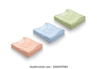 Blank Colored Folded Square T-shirt Mockup Stack, Side View, 3d Rendering. Empty Pink, Blue And Green Crumpled Tshirt Mock Up, Isolated. Clear Casual Unisex Clothing Heap With Sticker. 3D Illustration