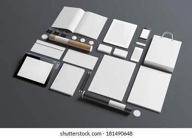Blank corporate identity elements on wooden background