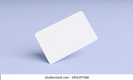 Blank credit card mockup floating over a blue background in realistic 3D rendering. Rounded corners business card mock up for design template