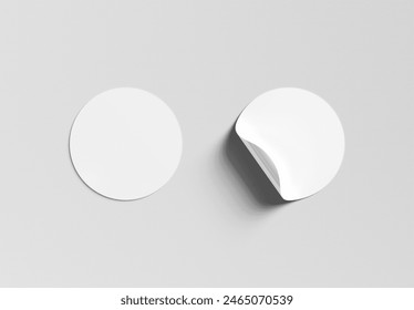 Blank curled sticker mockup isolated on white. Circular label template. 3D rendering
