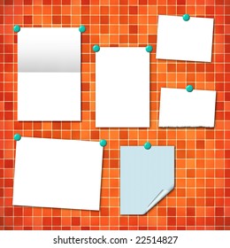 Blank notes (different textures) on a tiled wall