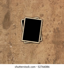Blank photo frames on cement wall