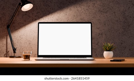 Blank screen of laptop for mockup. Workspace with computer, coffee cup, plant and desk lamp. Horizontal format.
