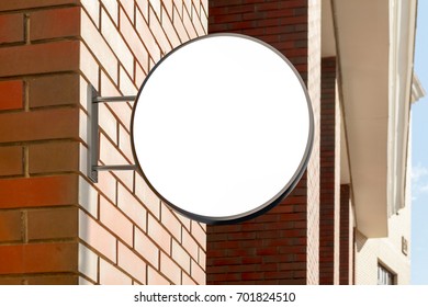 Blank Shop Sign Om Brick Wall. Round Signage Mockup. 3d Illustration.