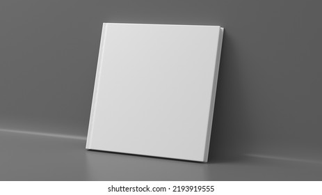 Blank Square Hardcover Book Cover Mockup Standing On Gray Background. 3d Render