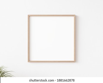 Blank Square Picture Frame With Thin Wooden Border Hanging On White Wall. 3D Illustration.