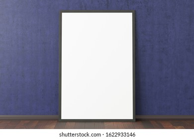 Blank vertical poster frame mock up standing on dark parquet floor next to blue wall. Clipping path around poster. 3d illustration