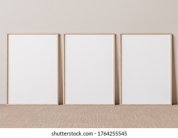 Blank Vertical Poster Frame Mock Up Standing On Beige Floor. Three Wooden Frames Isolated In Scandinavian Interior. 3d Render, 3D Illustration