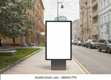 Blank Vertical Street Billboard Poster On City Background. 3d Illustration.