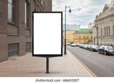 Blank Vertical Street Billboard Poster On City Background. 3d Illustration.