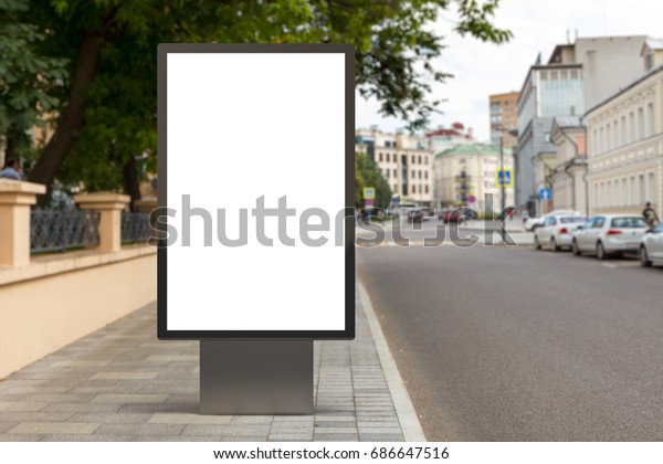 Blank vertical street billboard poster on\
city background. 3d\
illustration.