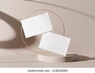 Blank white business cards with golden ring on the cream background. Mockup for branding identity. Two cards to show both sides. Template for graphic designer. Free space, copy space. 3D rendering.