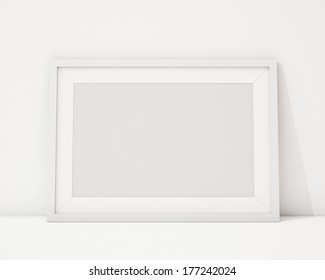 Blank White Horizontal Picture Frame On The White Interior Background