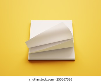 Blank White Paper Notepad isolated on yellow background