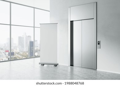 Blank White Poster On Concrete Floor In Modern Light Business Hall With Elevator And City View From Big Window. 3D Rendering, Mockup