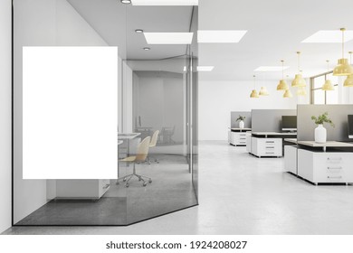 Blank White Poster On Glass Wall In Modern Open Space Office With Grey Furniture And Yellow Lights. Mockup. 3D Rendering