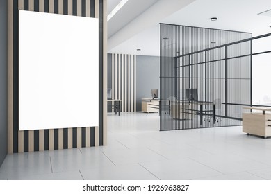 Blank White Poster On Wooden Wall In Modern Open Space Office With Airy Partition, Wooden Tables, And Big Window. 3D Rendering, Mock Up