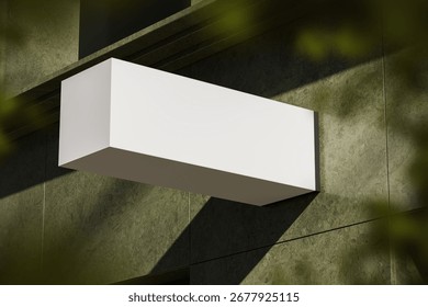 Blank white rectangular signboard mockup on green stone wall, realistic style, with natural shadows, concept of branding or outdoor advertising, 3D Rendering