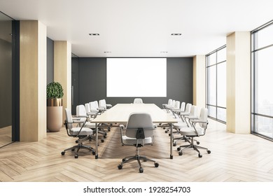 Blank White Screen On Dark Wall In Eco Style Conference Room With Modern Furniture And Parquet Floor. 3D Rendering, Mockup