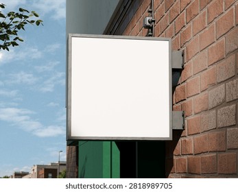 Blank white square storefront sign mockup on red brick building exterior with sky background