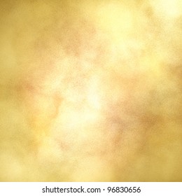 Blotchy Gold Background With Center Highlight For Copyspace And Soft Faded Vintage Grunge Texture Design Layout