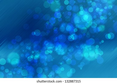 Blue abstract background in blurred bokeh lights