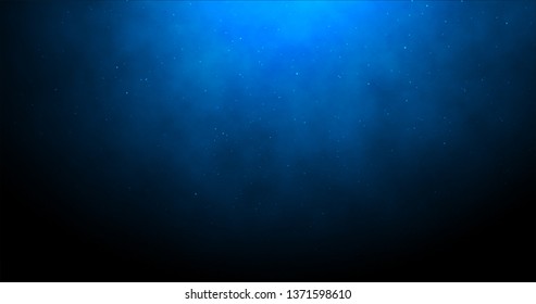 Blue background with light glow and particles. - Shutterstock ID 1371598610