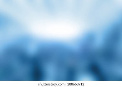 Blue blurred background.